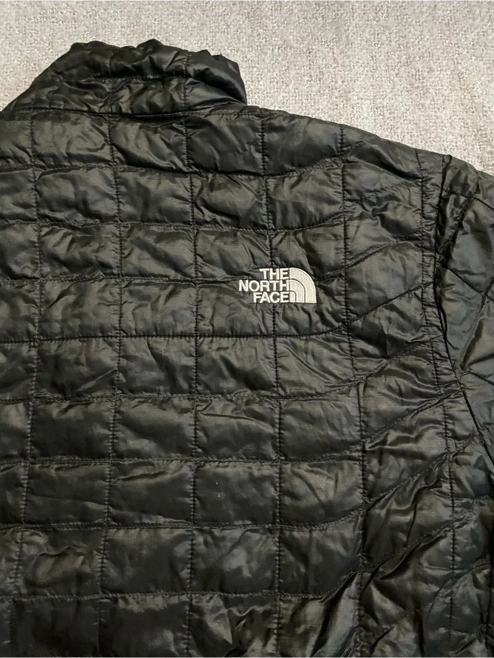 The North Face Black Quilted Puffer Jacket with Logo